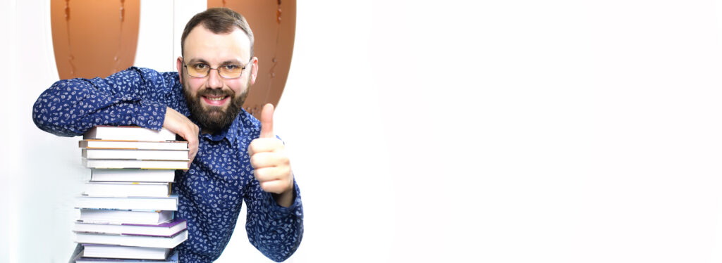 bearded man with textbooks study white background